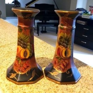 A pair of porcelain pomegranate candlesticks